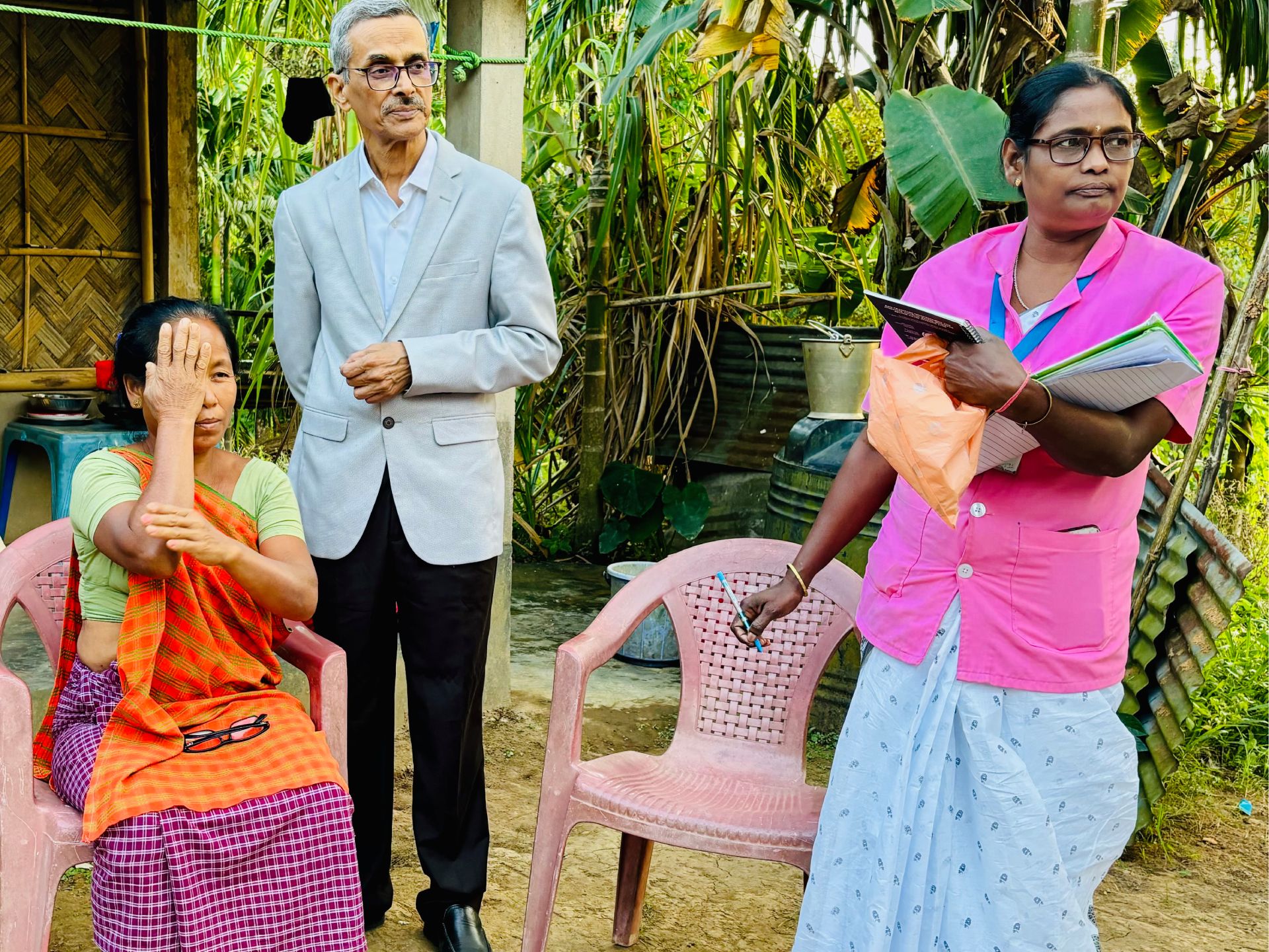 Ms Jamina Rongchong getting her vision tested under the supervision of Dr Harsha Bhattacharjee, president, Sri Sankaradeva Nethralaya, Guwahati, and Aggregated Social Eye Care Activists (ASECA) Ms Kanchan Roy