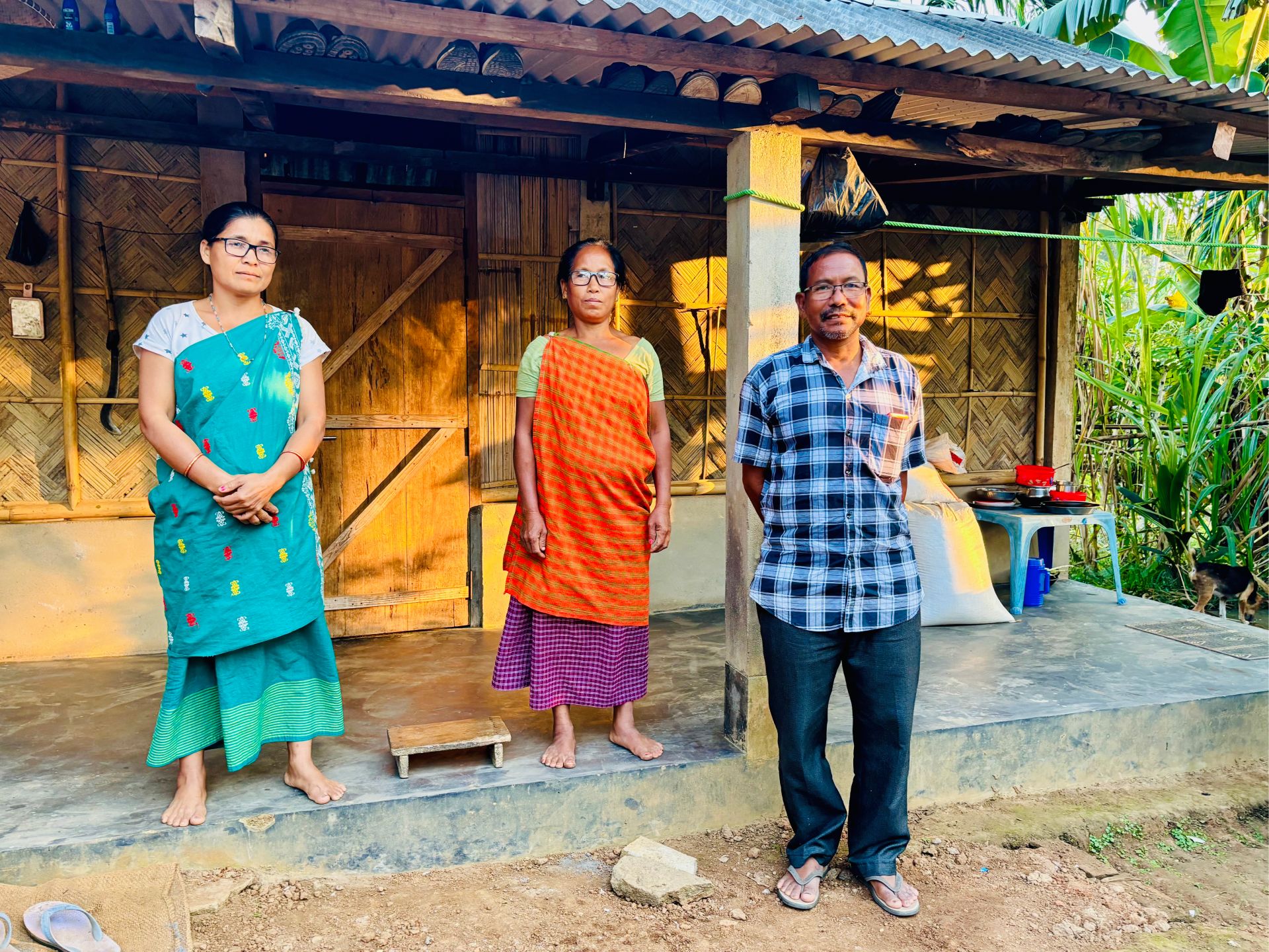 Ms Sunduki Tarang, Ms Jamina Rongchong and Mr Mohan Rongpeh donning spectacles they received free under a social community outreach programme