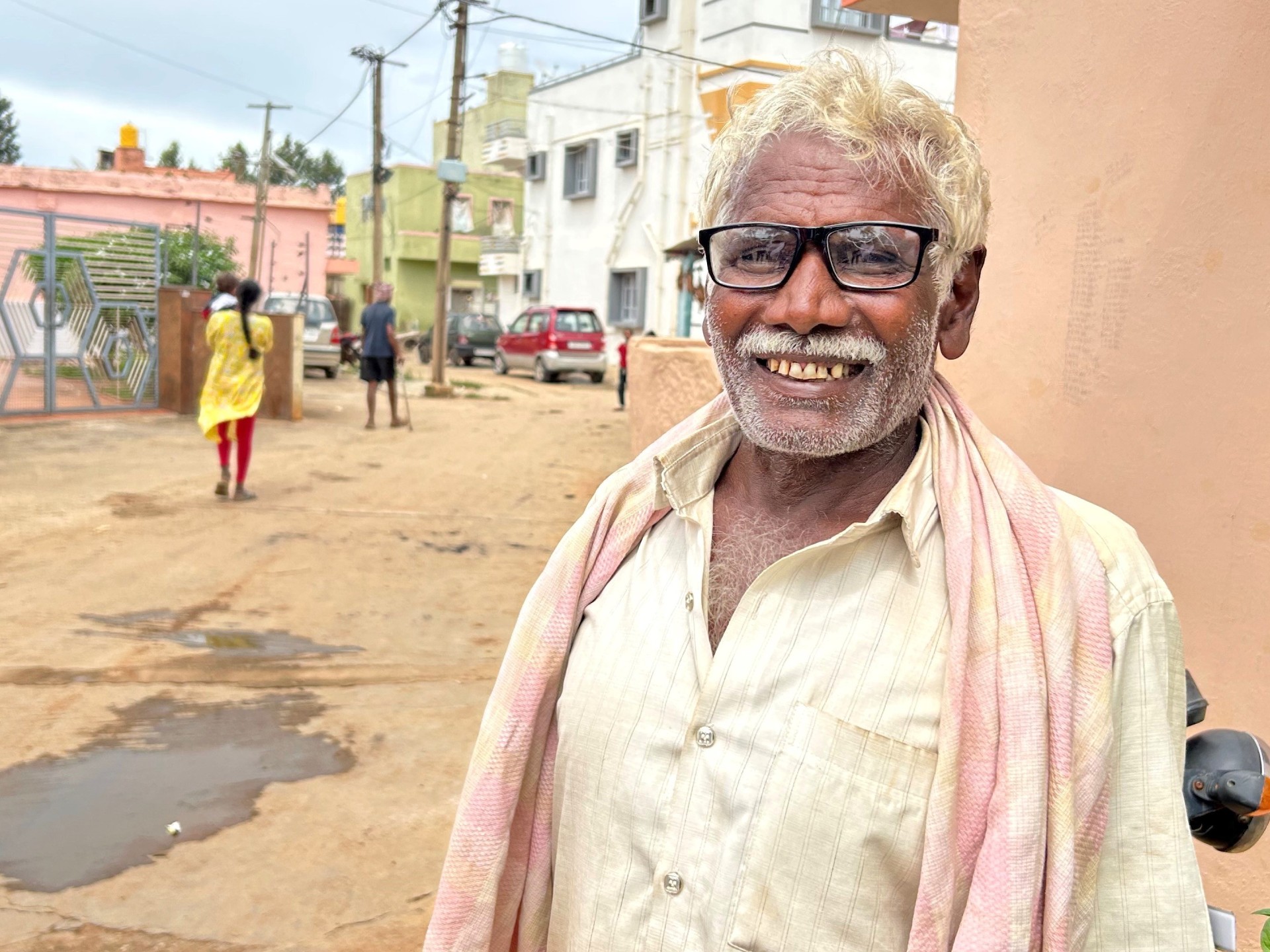 Mr S. D. Ramchandrappa, 74, from Sabbenahalli village in Chikkaballapura district, beams with joy after receiving a new pair of spectacles free of cost.