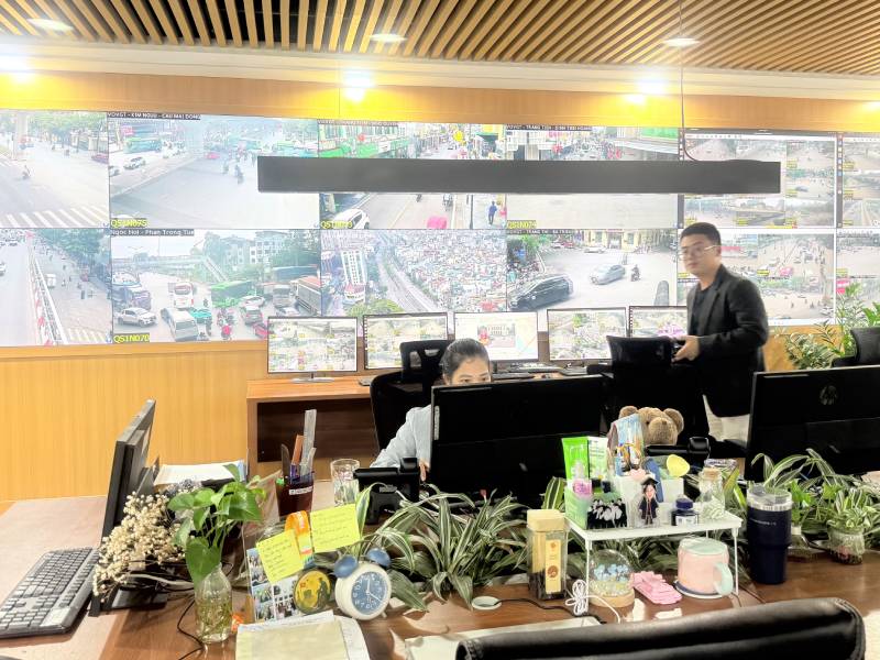 A grid of live camera feeds from the street of Ha Noi in the offices of Viet Nam's national public broadcaster helps bring real time traffic updates to the public