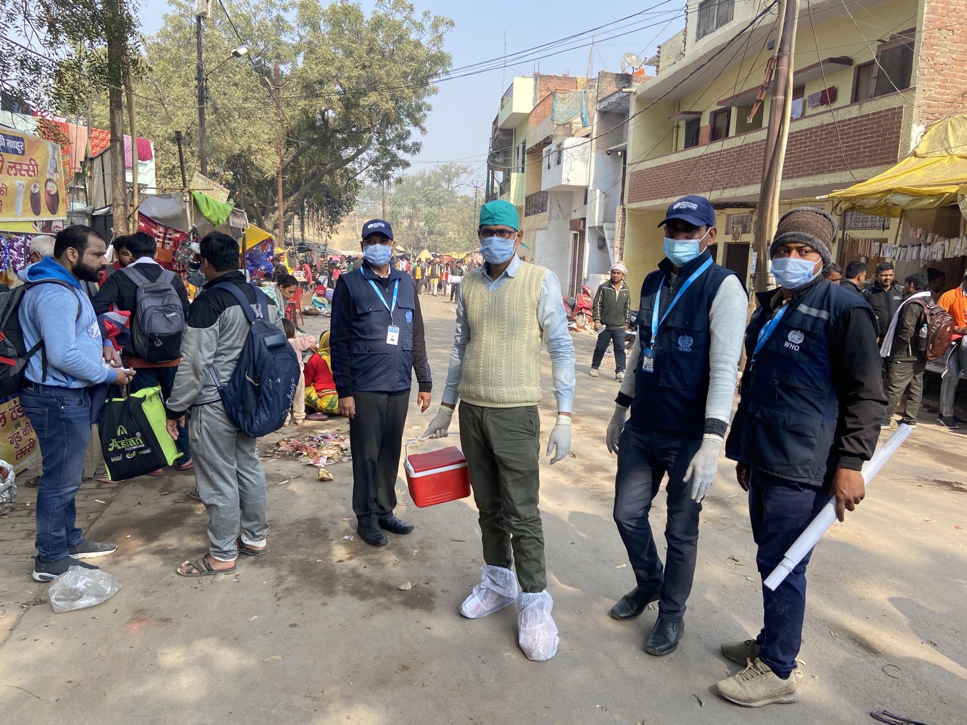 A group of people wearing face masks