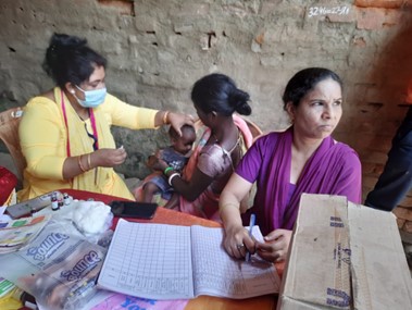 Health workers provide counselling immunization antenatal care and family planning at health camp