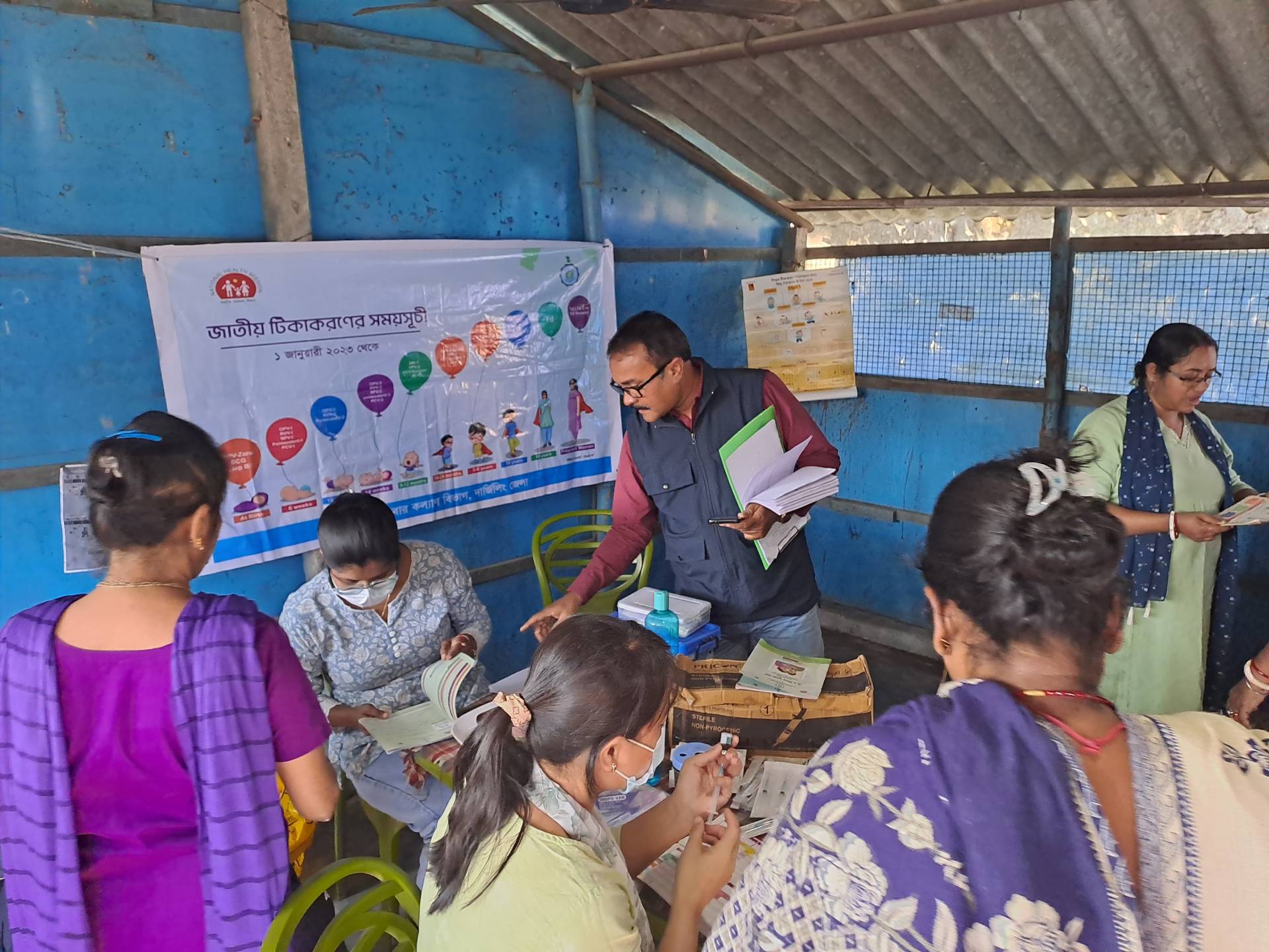 WHO-NPSN team monitoring immunization session at Dharma Nagar Club, Siliguri during Special Immunization Drive.