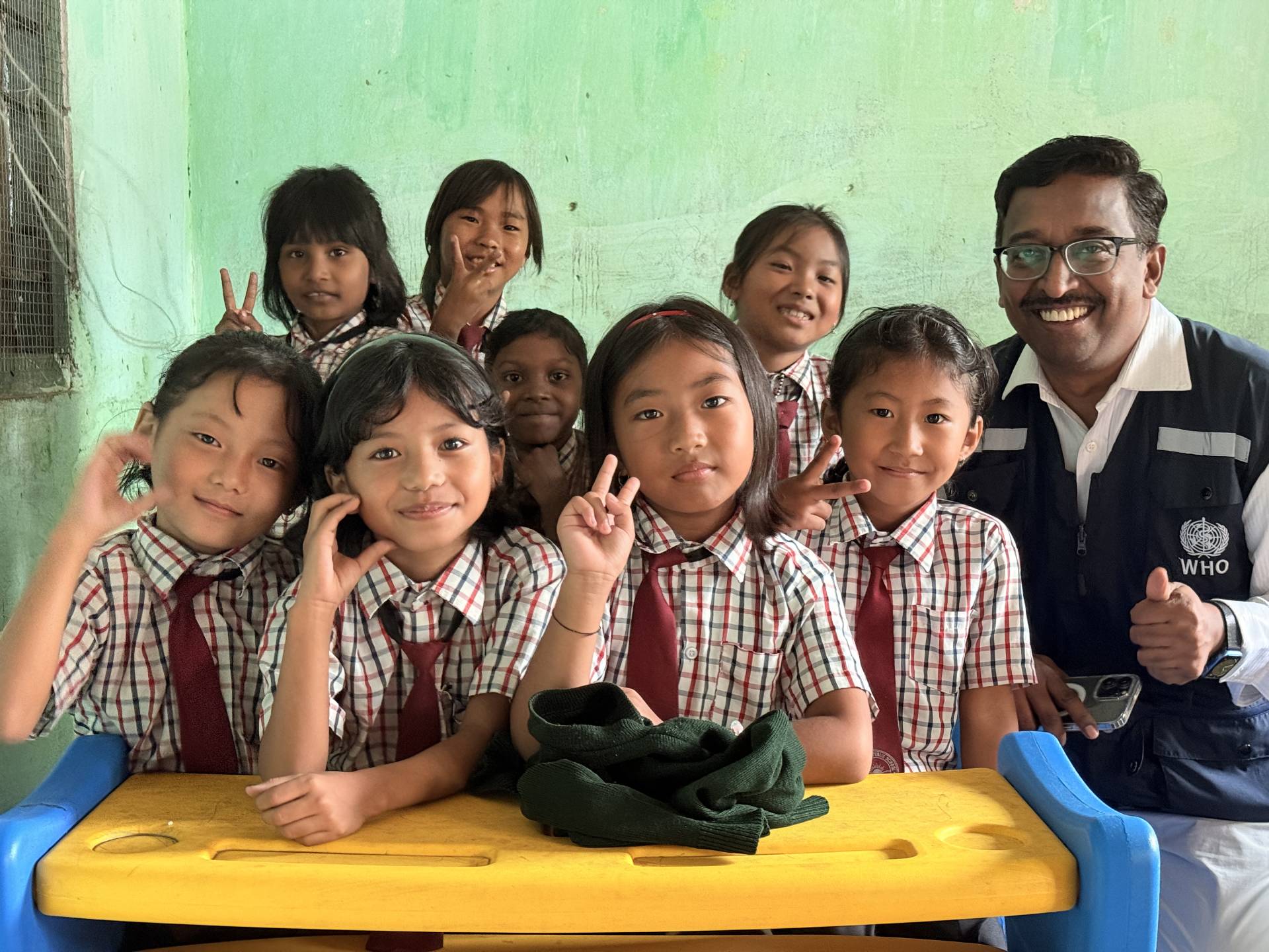 Students at Dannyan Public School receiving measles-rubella vaccines during WHO-supported catch-up campaign in Longding district.