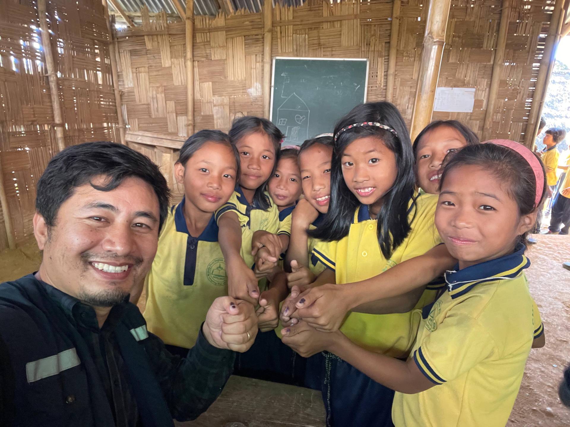 WHO team supervising school immunization sessions during measles-rubella catch-up campaign in Nginu, Longding district