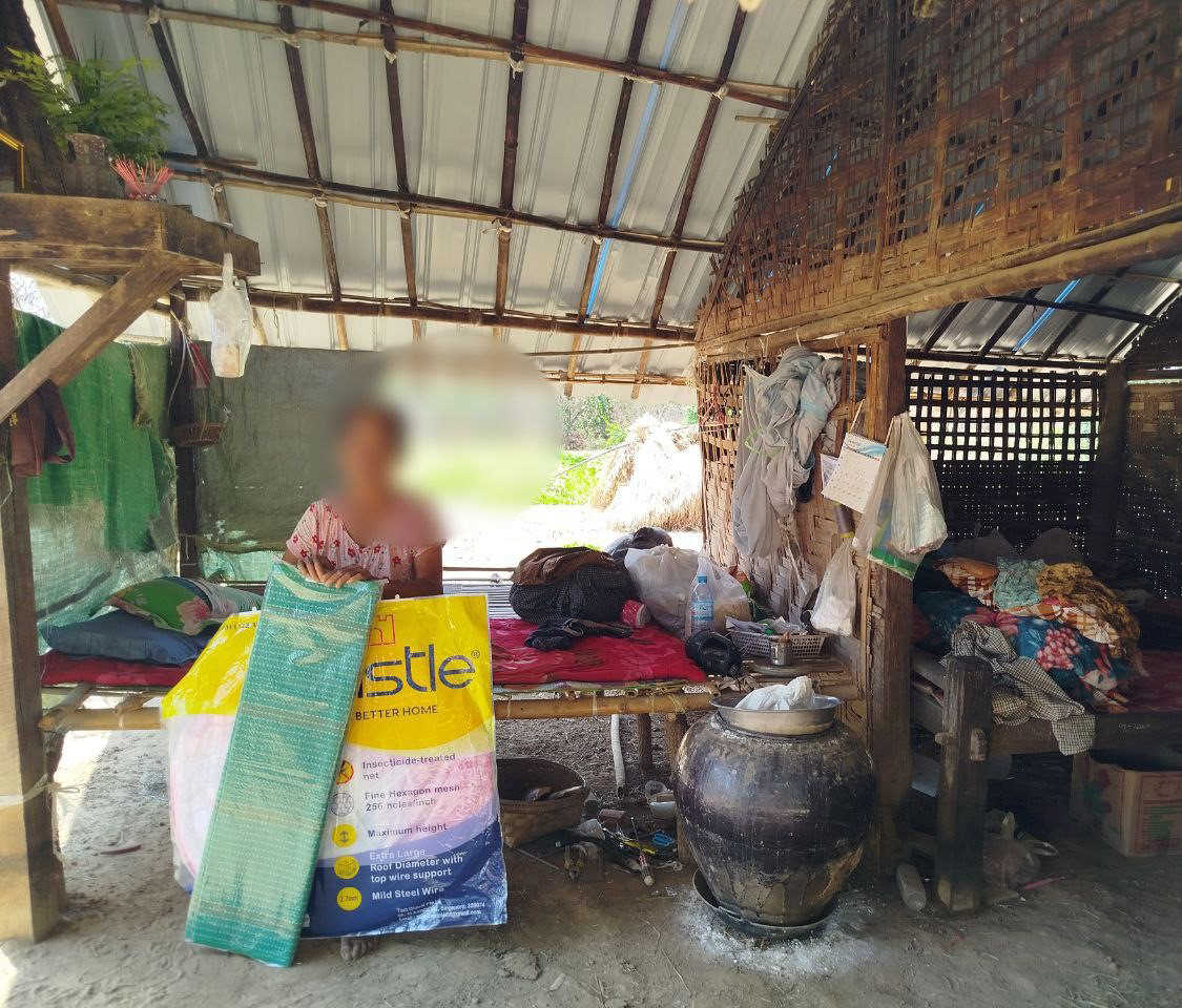 distributing mosquito tent nets to earthquake affected communities