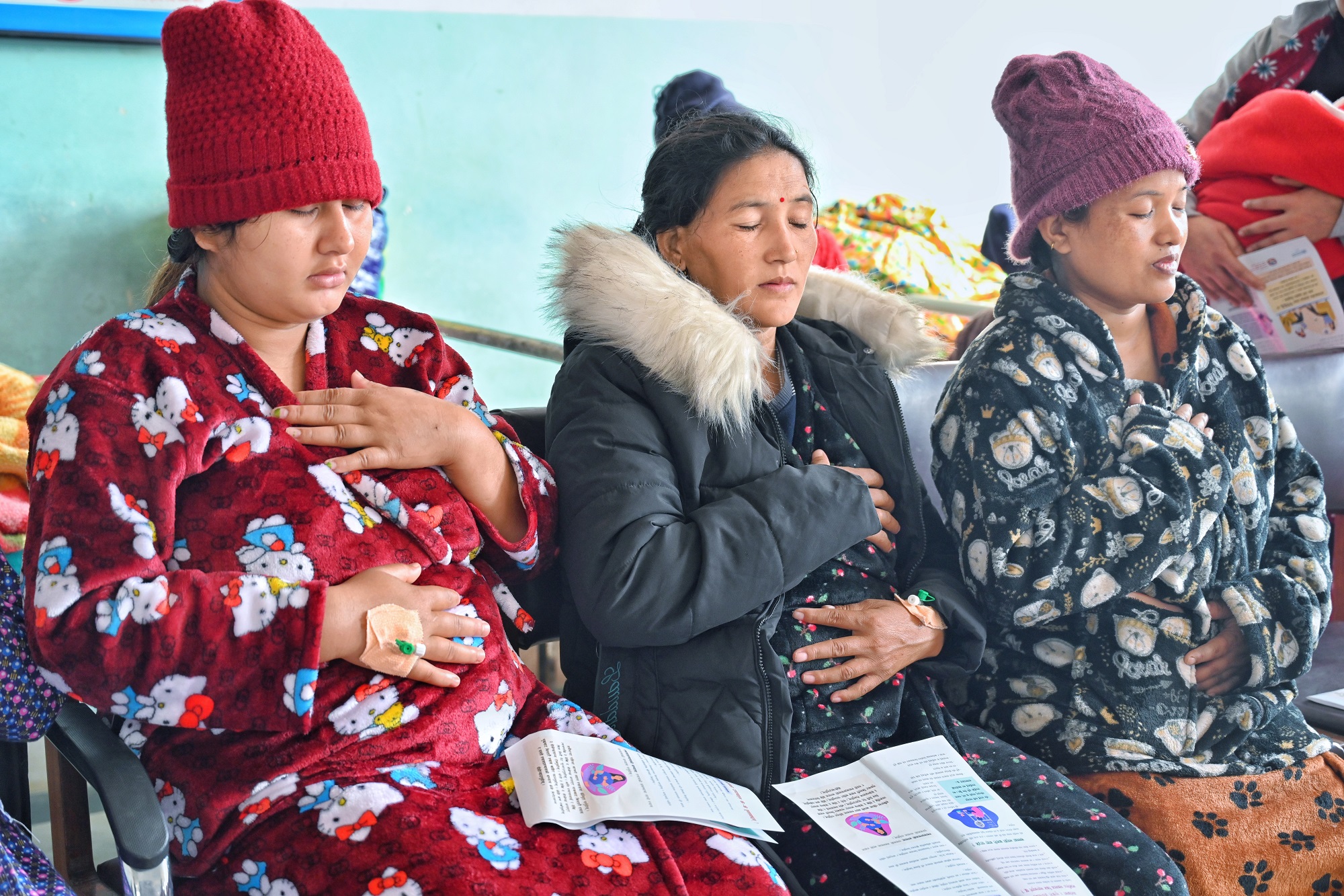 New mothers participate in a mental health education session led by an appointed psychiatrist at the Mental Health Outpatient Unit in Paropakar Maternity and Women’s Hospital, Nepal, where they are taught breathing techniques to manage high anxiety levels