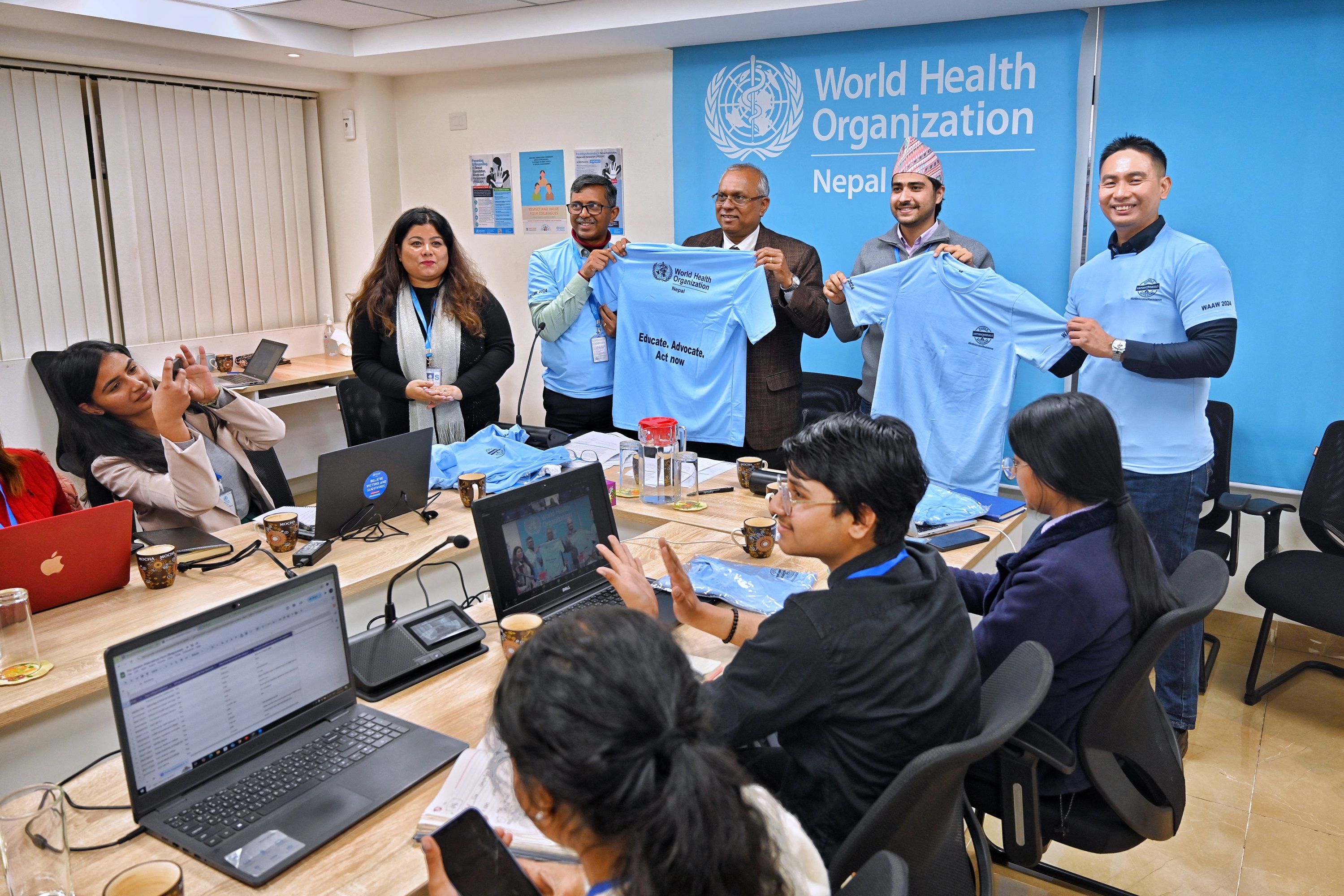 WHO and NYMAT-Nepal officially launch the campaign following a WHO-led technical session on AMR, marked by the symbolic handover of campaign T-shirts to volunteers