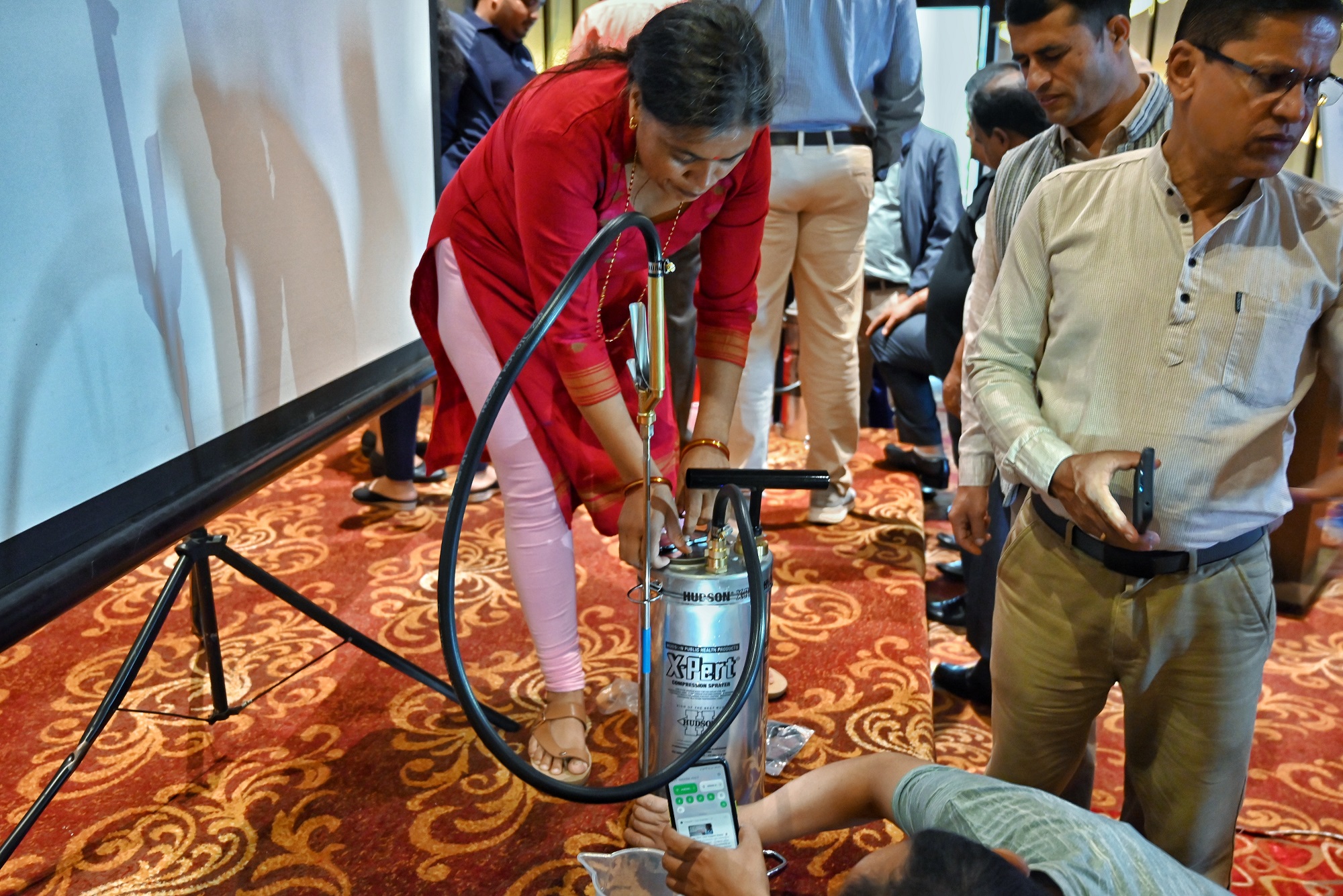 Participants learning about compressor pumps during the hands-on training of trainers on Indoor Residual Spraying for vector-borne diseases held in Bagmati province, Nepal
