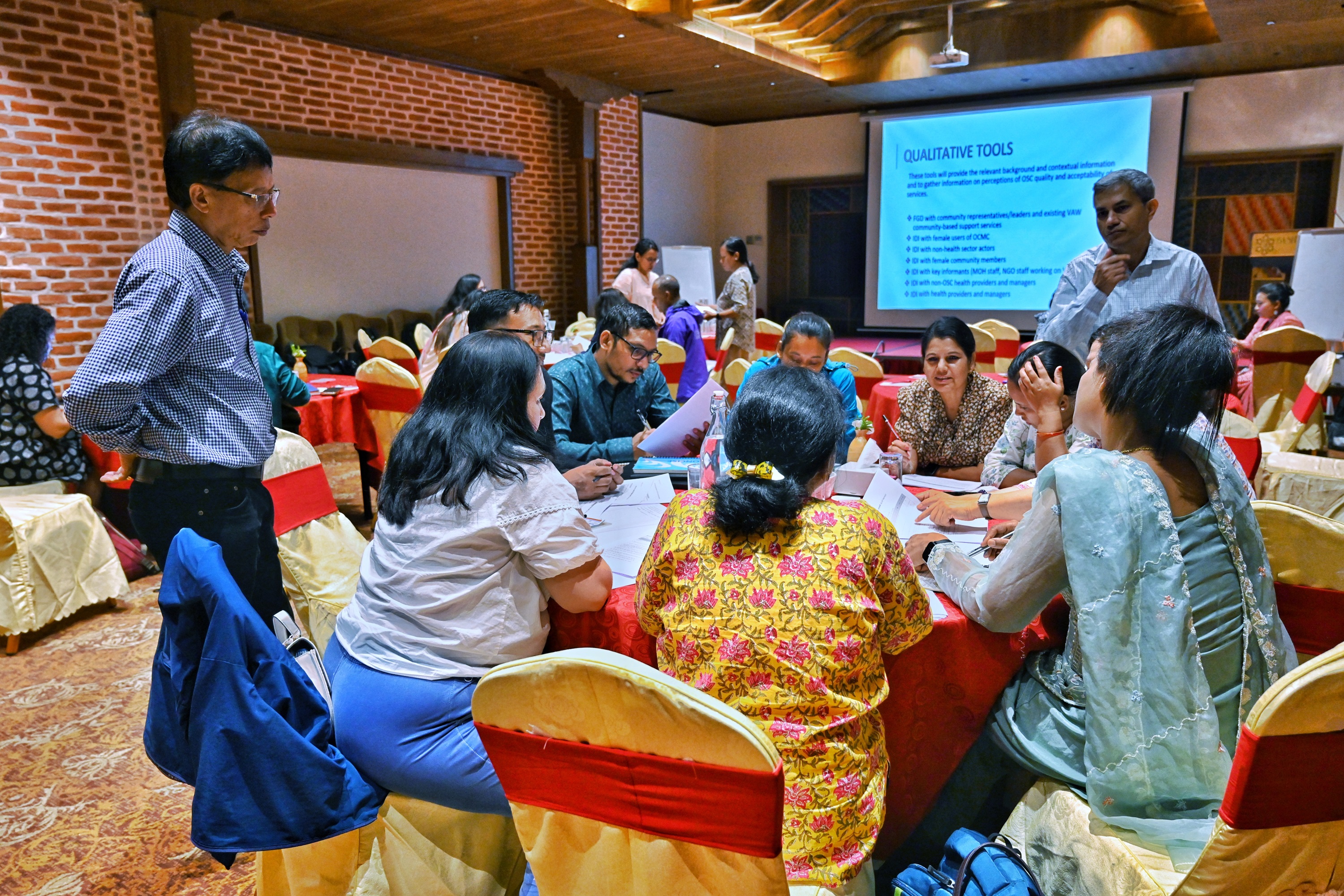 Participants actively engaged in the workshop held in Nepal to assess the national One-Stop Crisis Management Centers (OCMC)