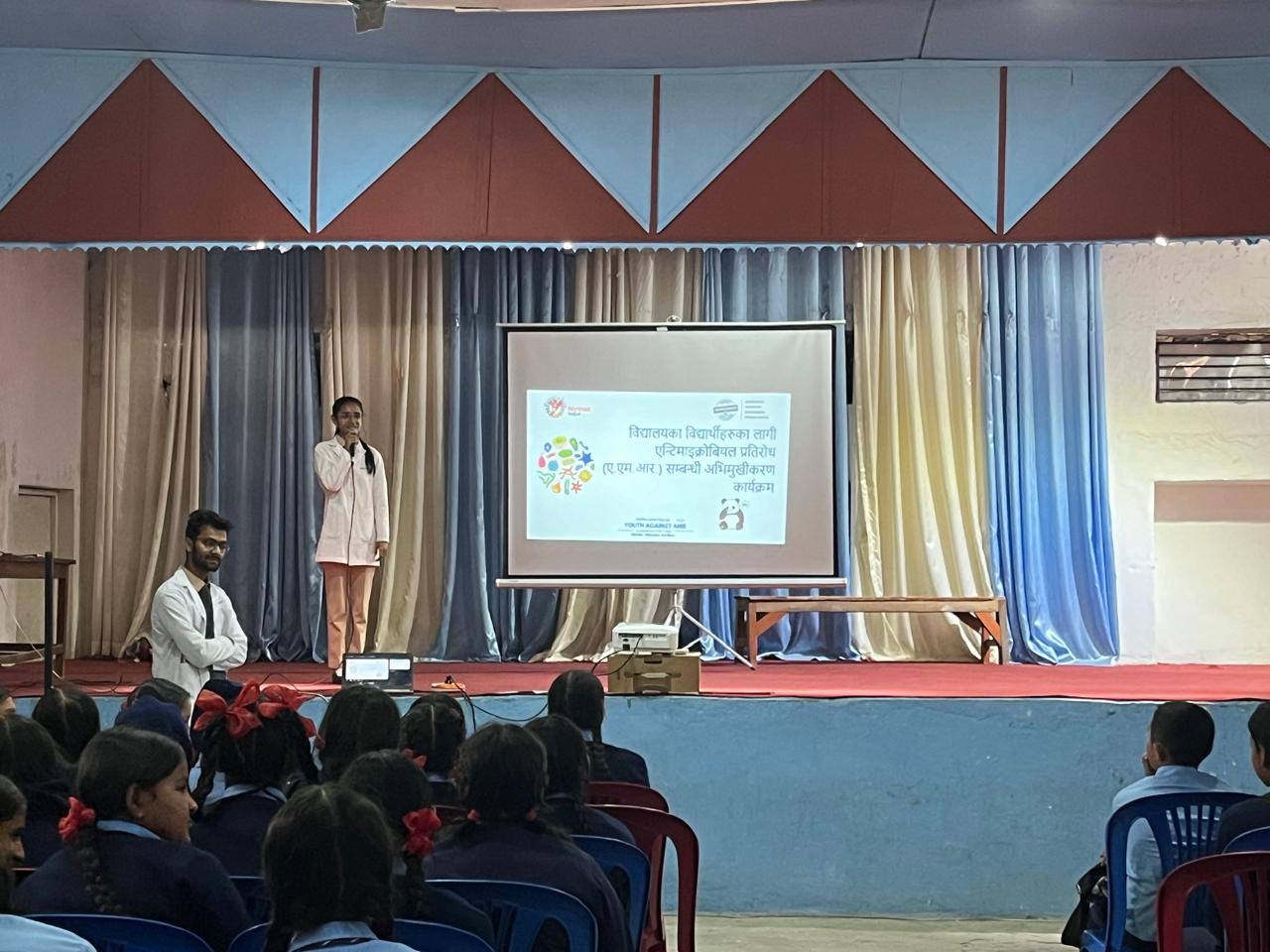 A campaign volunteer conducts an awareness session with Grade 9 students at Shree Amarsingh Model Higher Secondary School, Kaski district, Gandaki province, Nepal