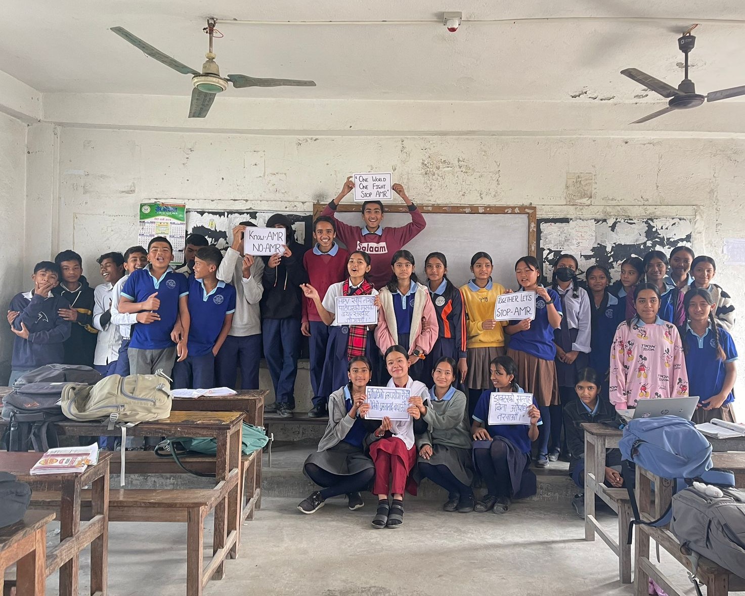 Students at Shikshya Niketan School in Morang district, Koshi Province, Nepal, pose for a photo following an educational session on AMR