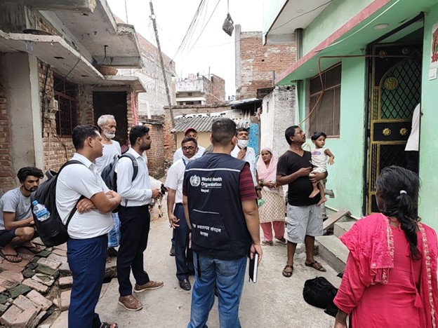 WHO personnel, along with local health authorities, conduct house-to-house visits as part of case detection and GPS mapping of affected households in Birgunj, Parsa district, Nepal