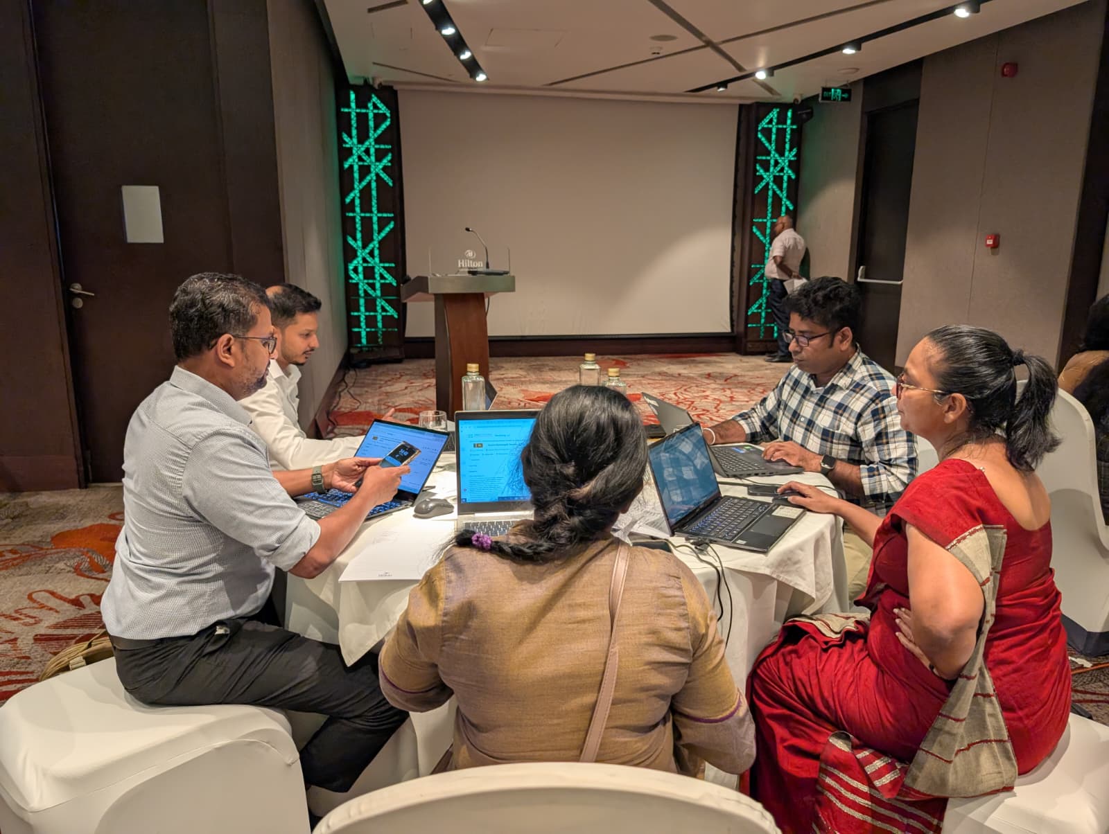 Participants actively designing an EIOS monitoring board for Sri Lanka during the workshop