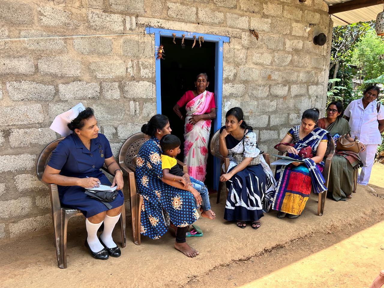 Picture showing field visit by the healthcare workers