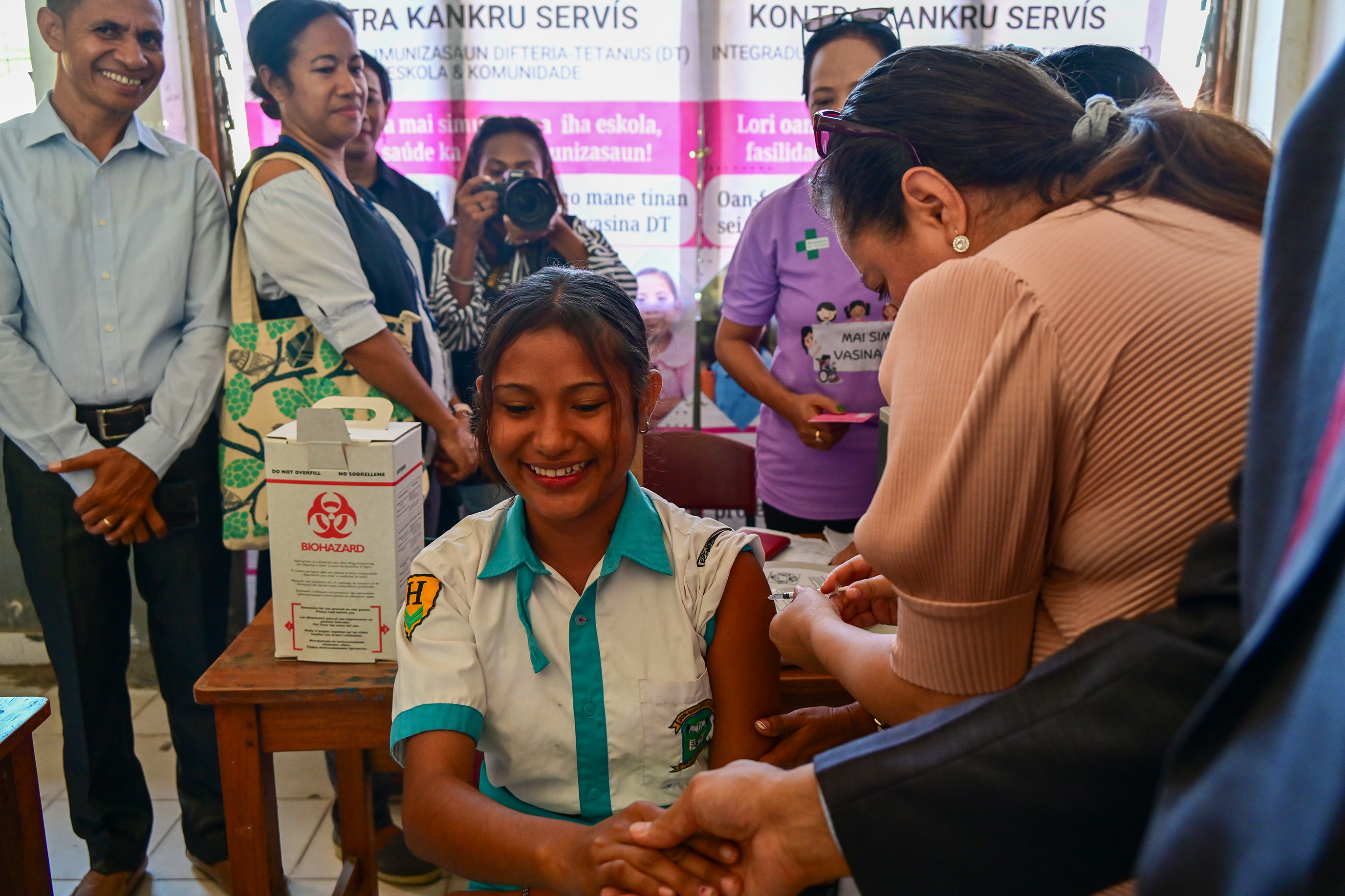 A student in Timor-Leste getting her HPV vaccination