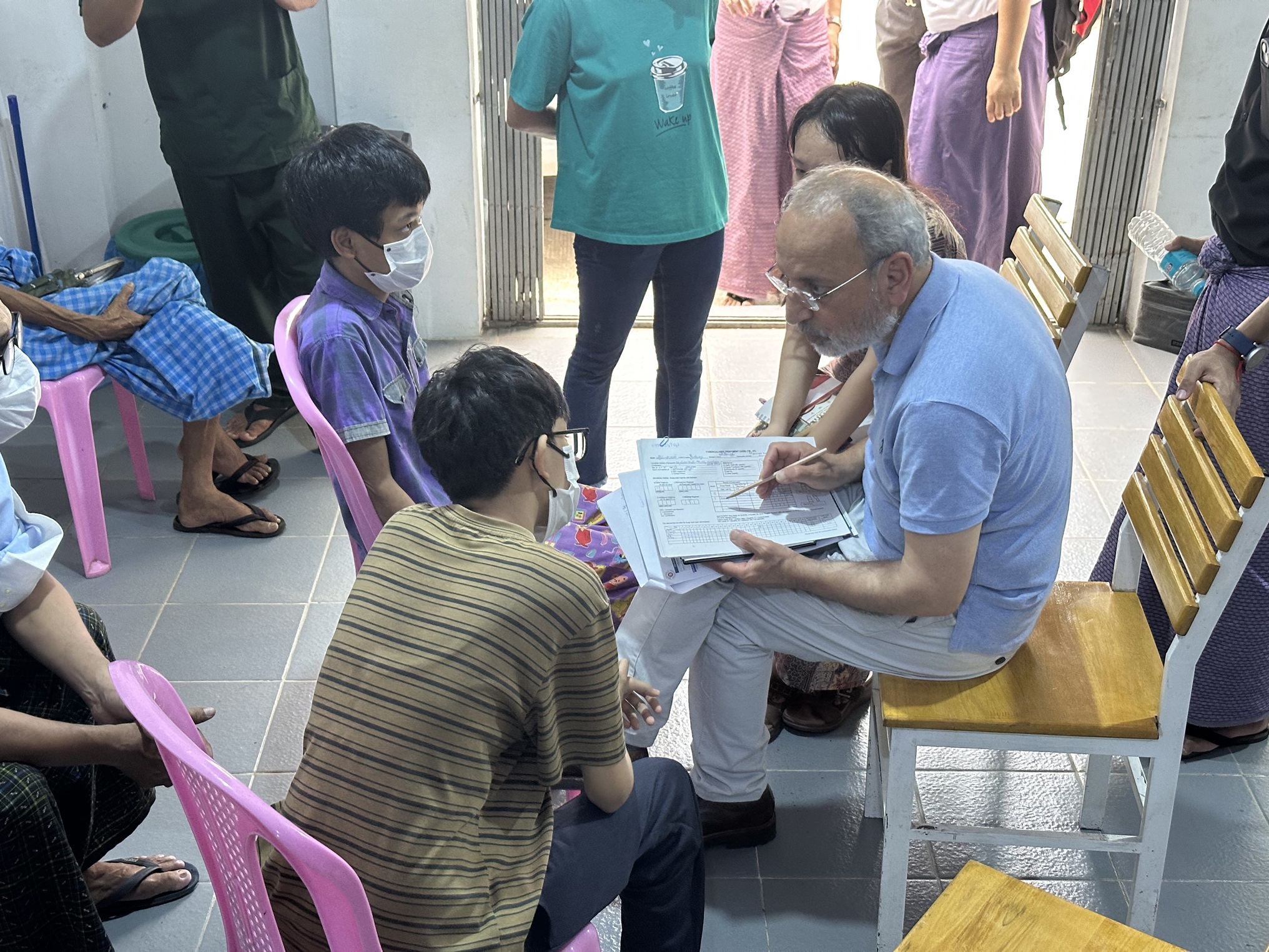 Team lead of JEMM interviewing the TB patient at TB clinic, Myanmar