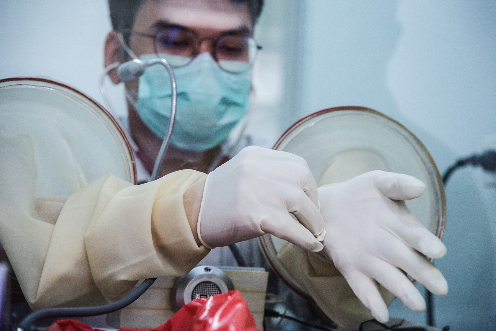 A doctor performs routine check on patients at COVID-19 Clinic, Samut Sakhon Hospital