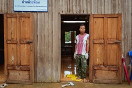 Panaeloi, a devoted VHV, stands in front of the Huai Hom Village health center, a place where he diligently works to support his community's health. © WHO 2023