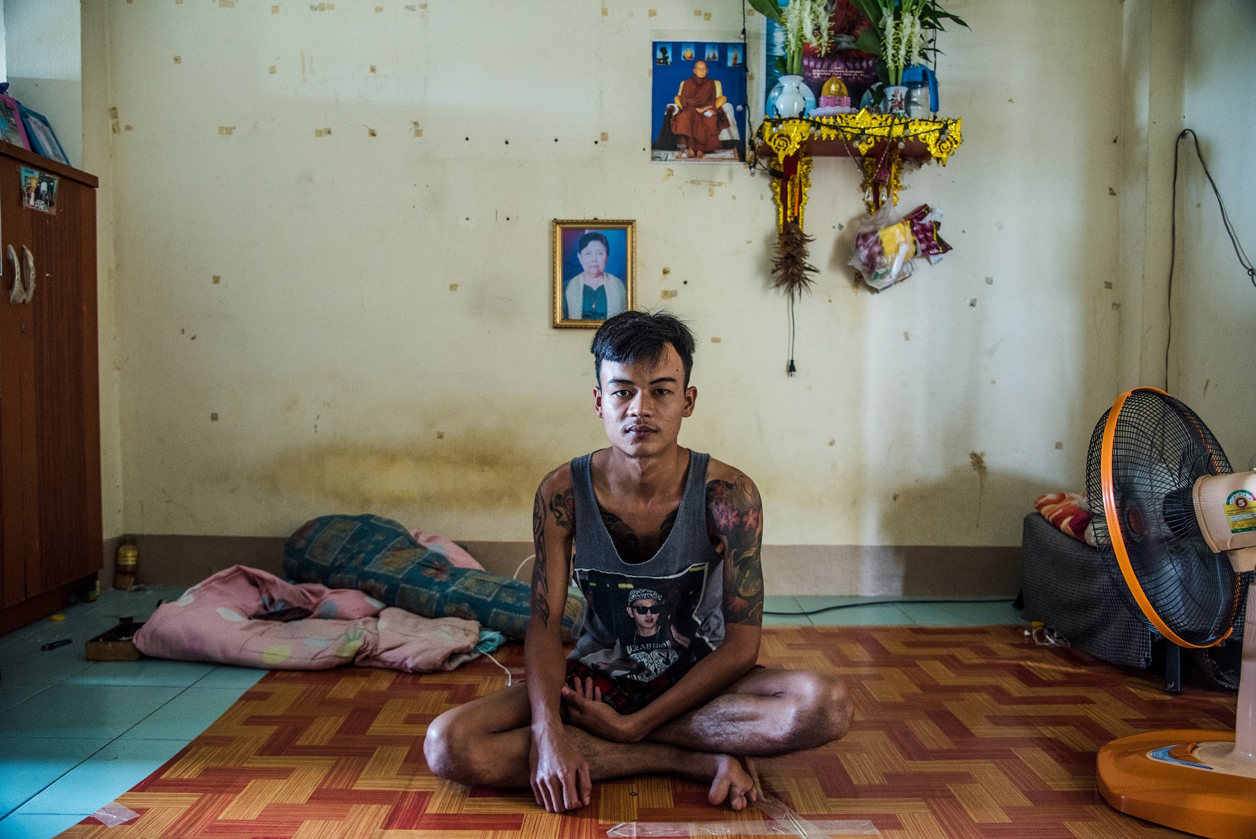 Wai Min Thu, 23 years old, in his dorm in Samut Sakhon migrant worker's village camp