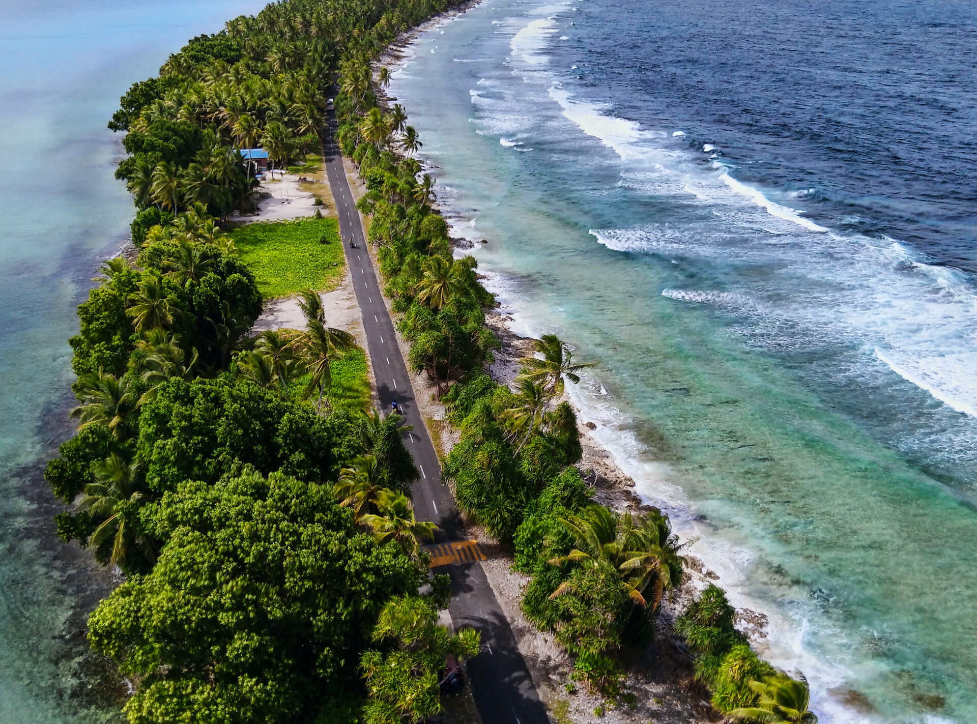 Aerial view of the shorelines nearing the main road in Tuvalu