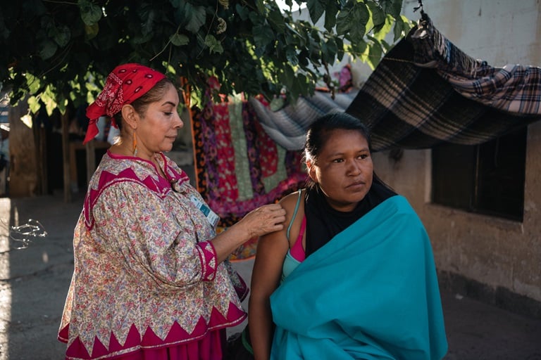 Health worker administering a vaccine