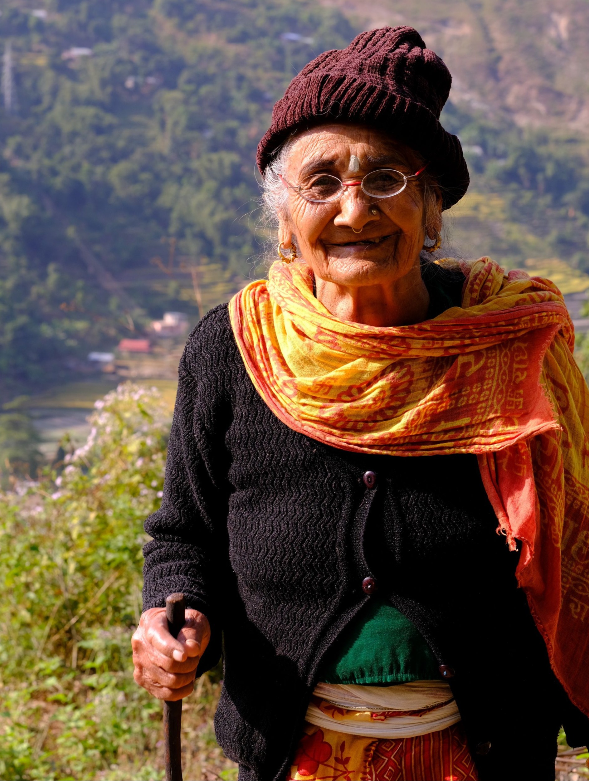 An older adult wearing eyeglasses