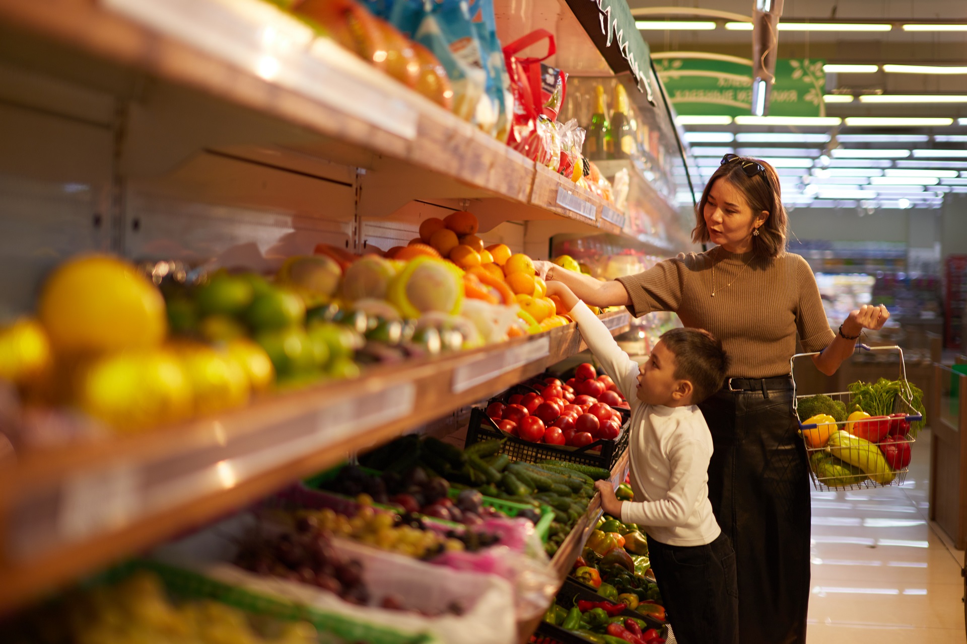 Mother and son buying healthy food