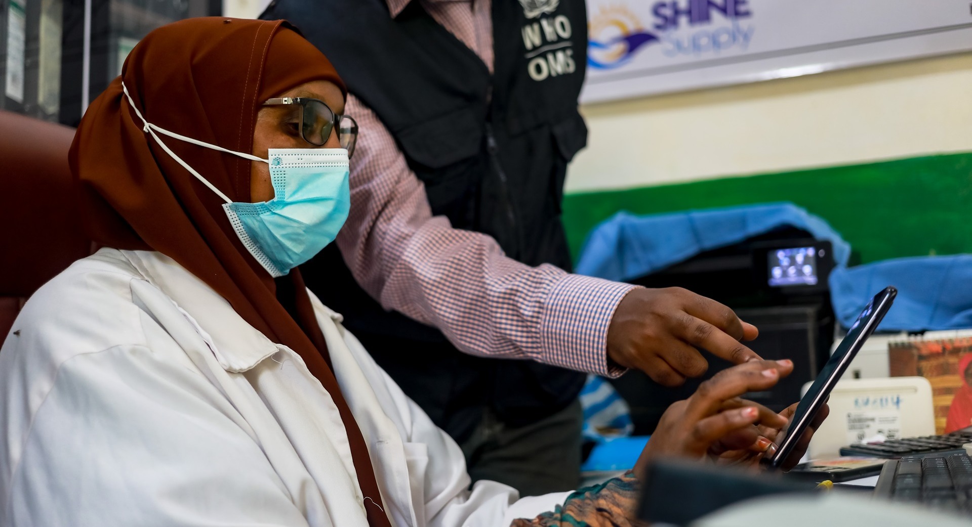 Training community health workd in Somalia Health worker using an electronic surveillance system in a health facility