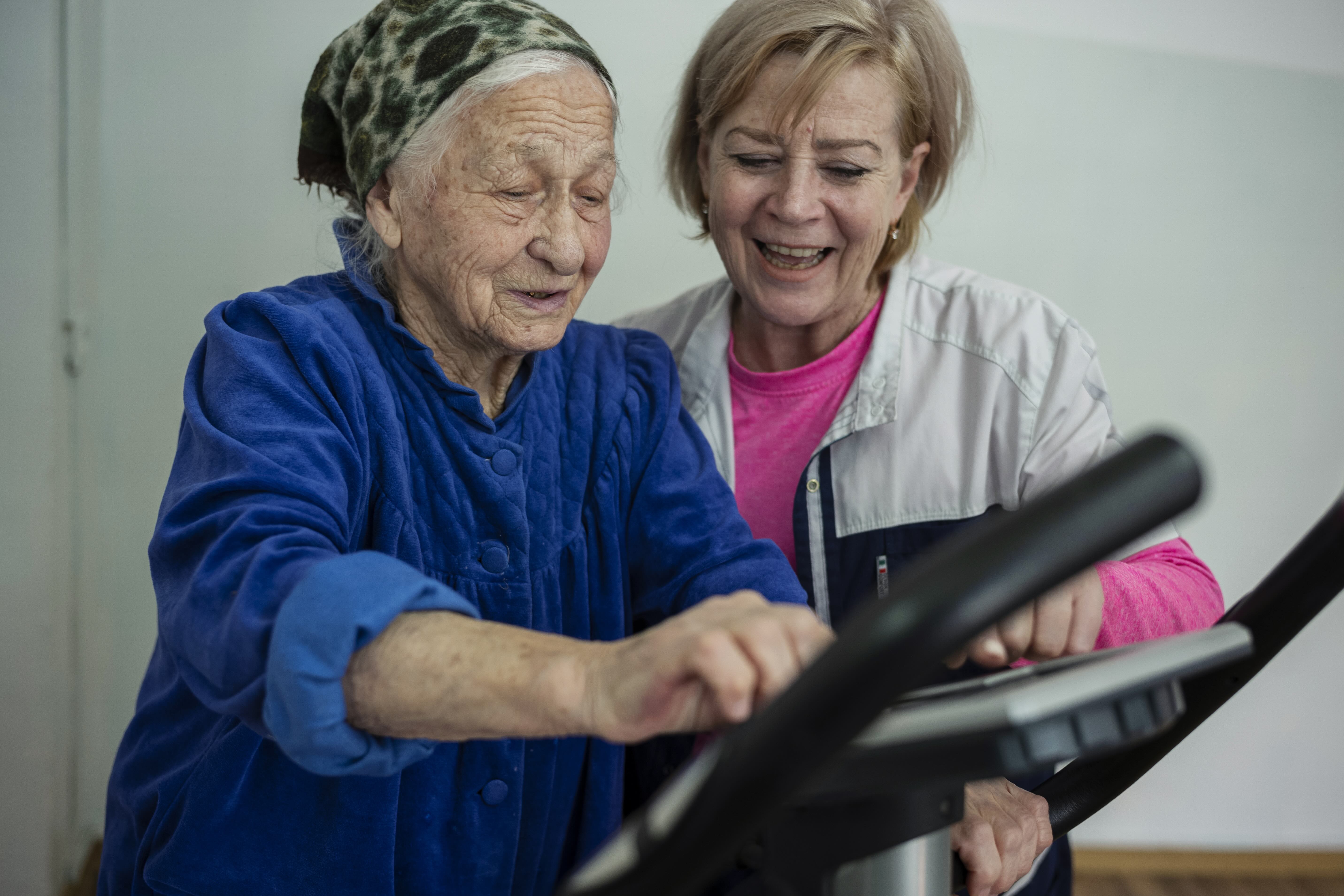 Ageing Kyrgyzstan 2022 Elderly woman and physical therapist