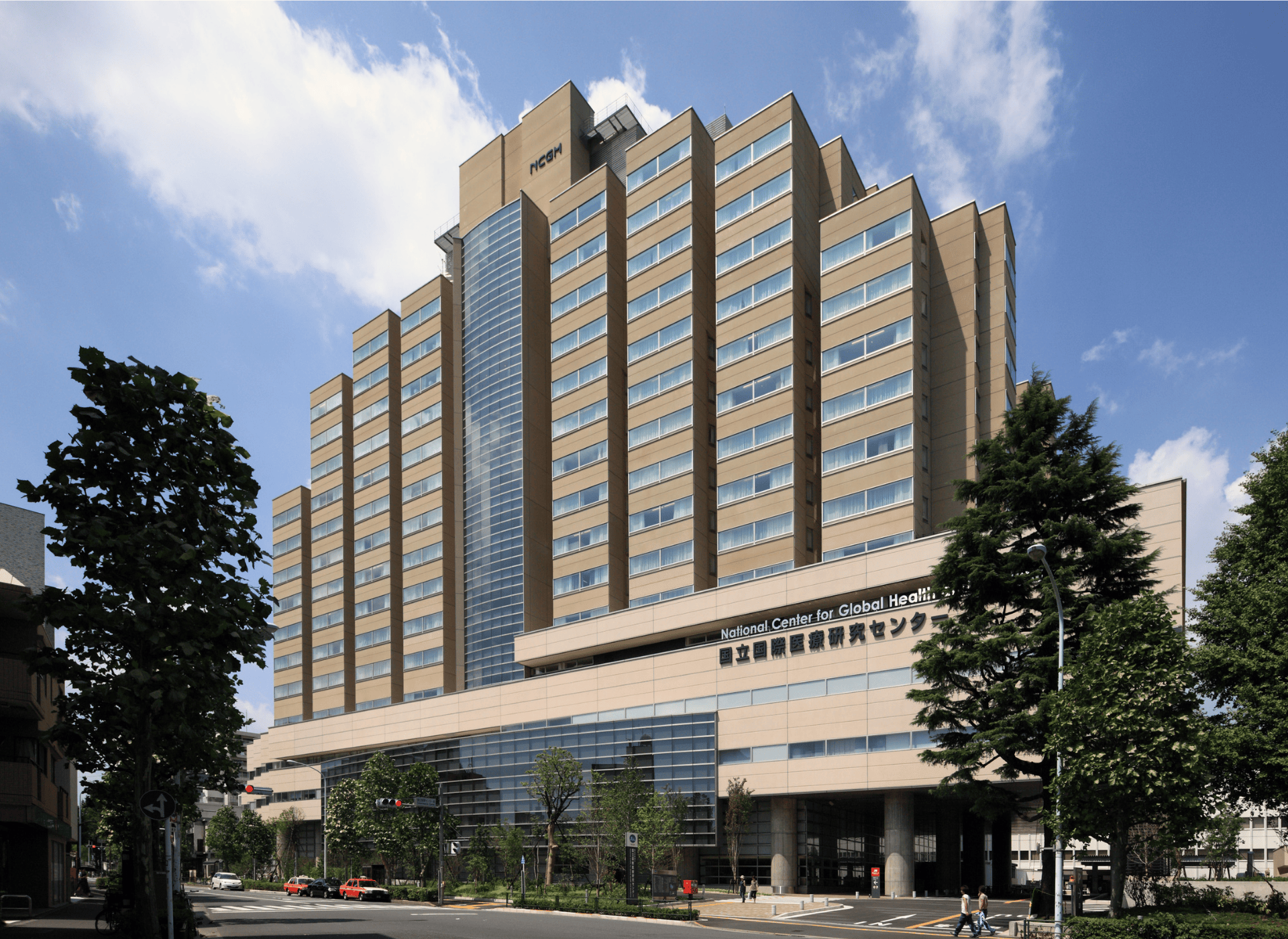 A building in Tokyo, Japan with trees in front