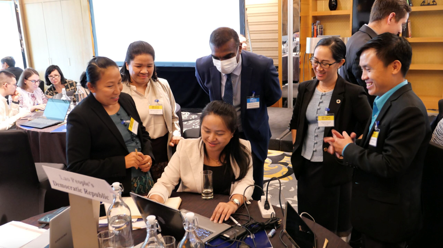 Delegates of Lao PDR trying the tool