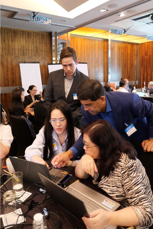 Delegates from Viet Nam testing the functionalities of the Equity Explorer