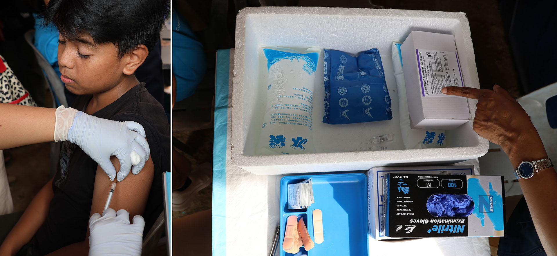 A child receives a vaccine injection while a tray displays medical supplies, gloves, and a cold box for storage.