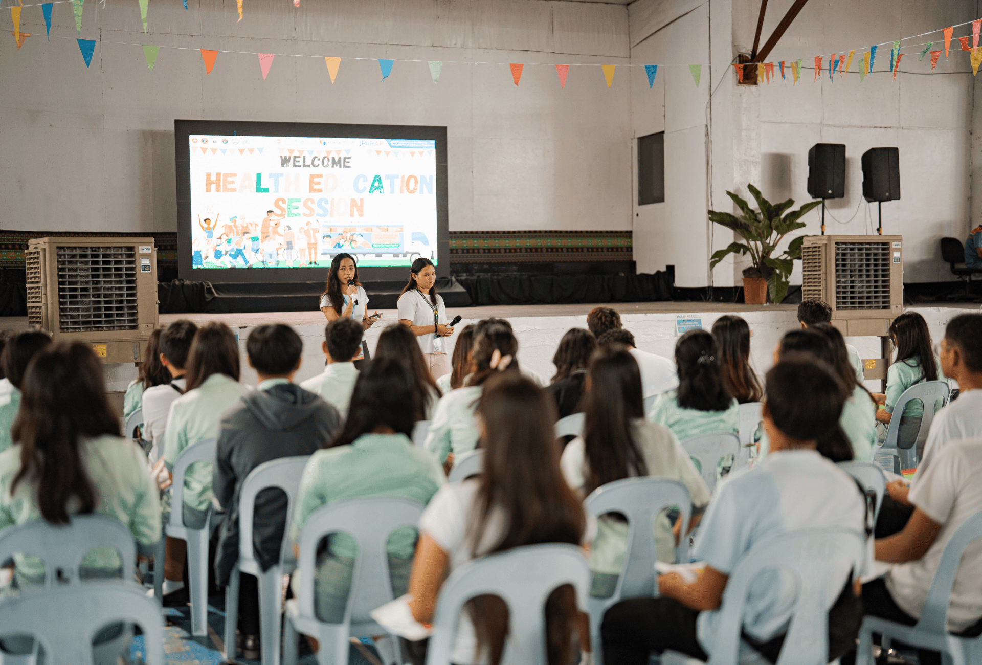 Peer educators talk to fellow young people in the Philippines