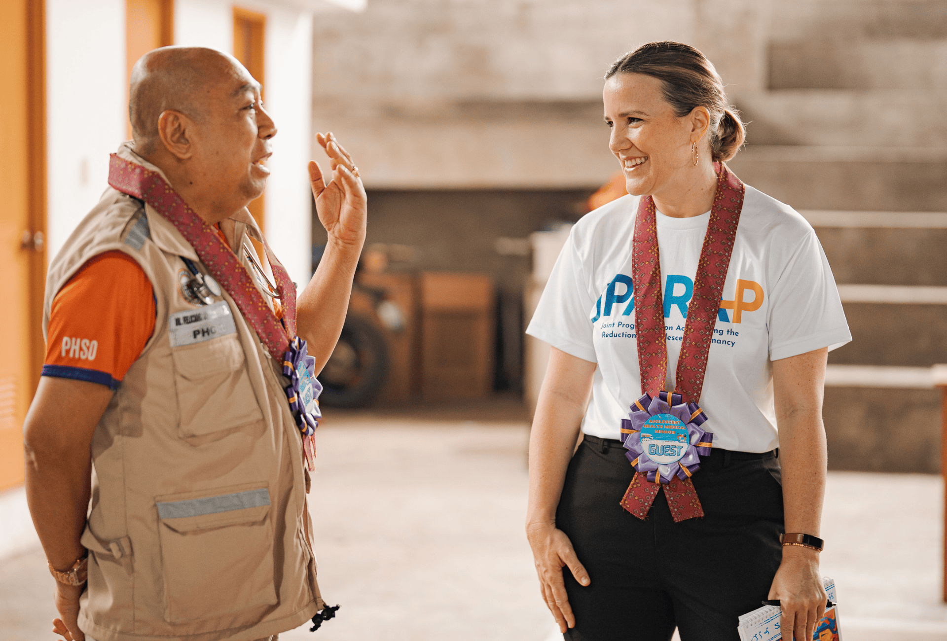 WHO Acting Deputy Representative in the Philippines speaks with a provincial health staff