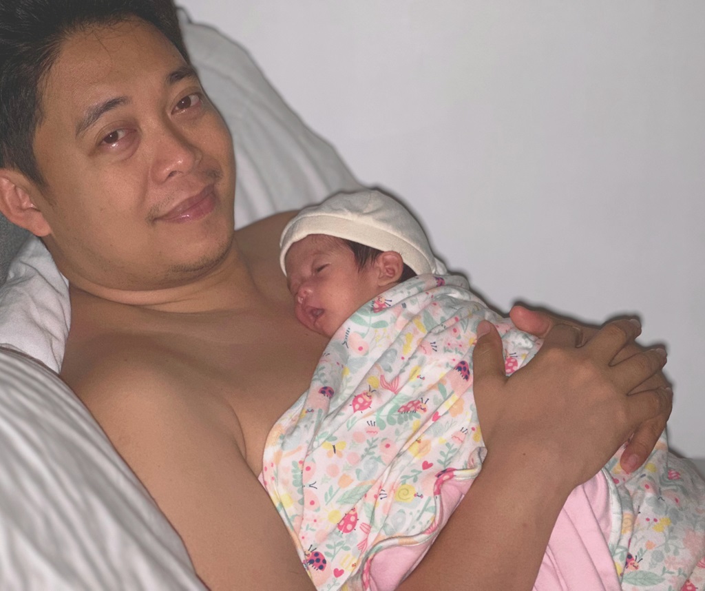 Dr Daystar Sedillo practising Kangaroo Mother Care