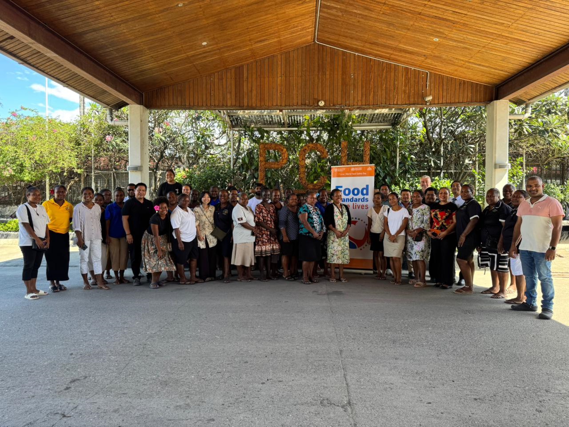 People posing for a group photo.