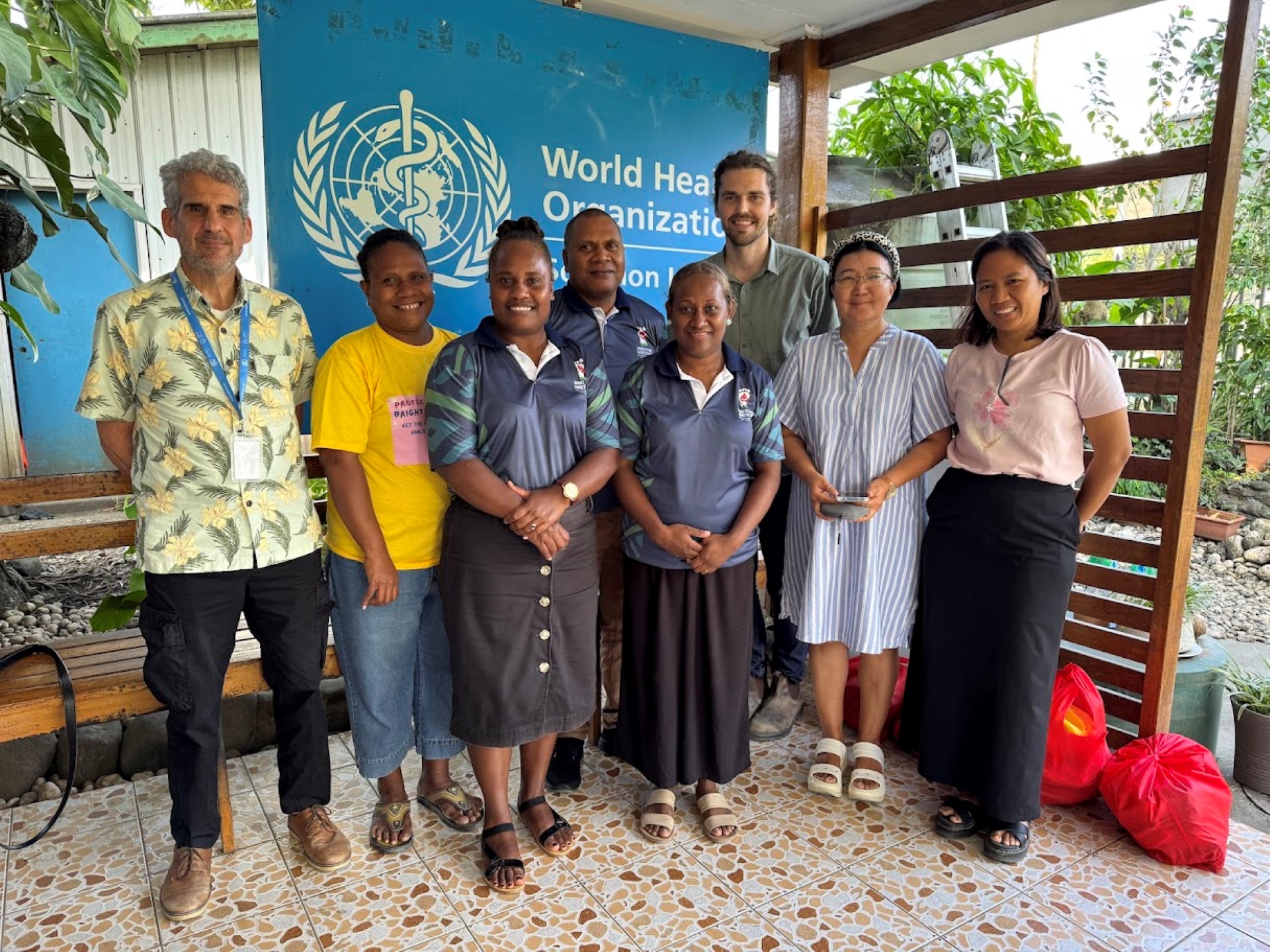 A group of people posing for a photo.