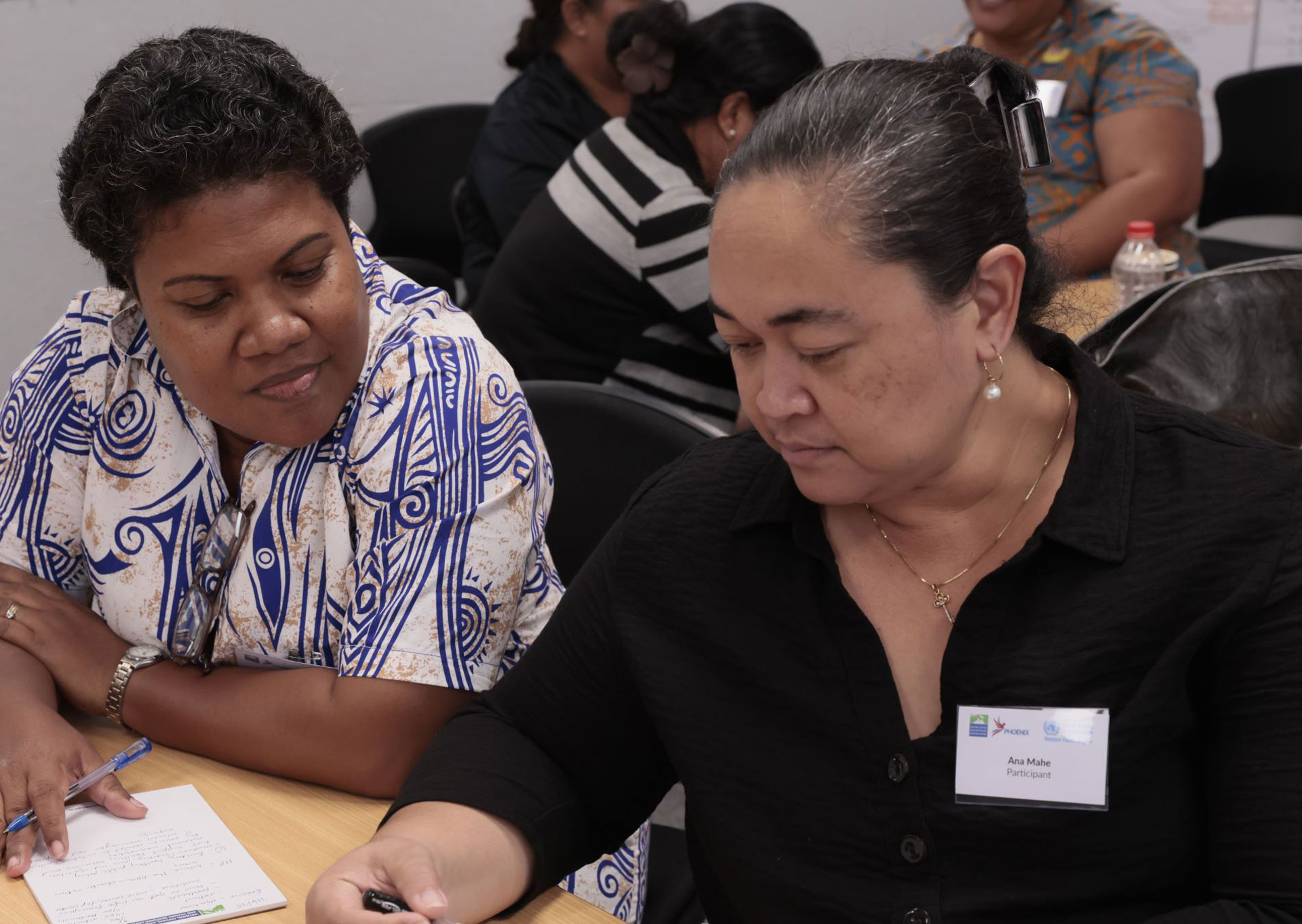 Dr ‘Ana Mahe (right) shares thoughts with Dr Ilisapeci Lasaro from the Ministry of Health and Medical Services of Fiji.