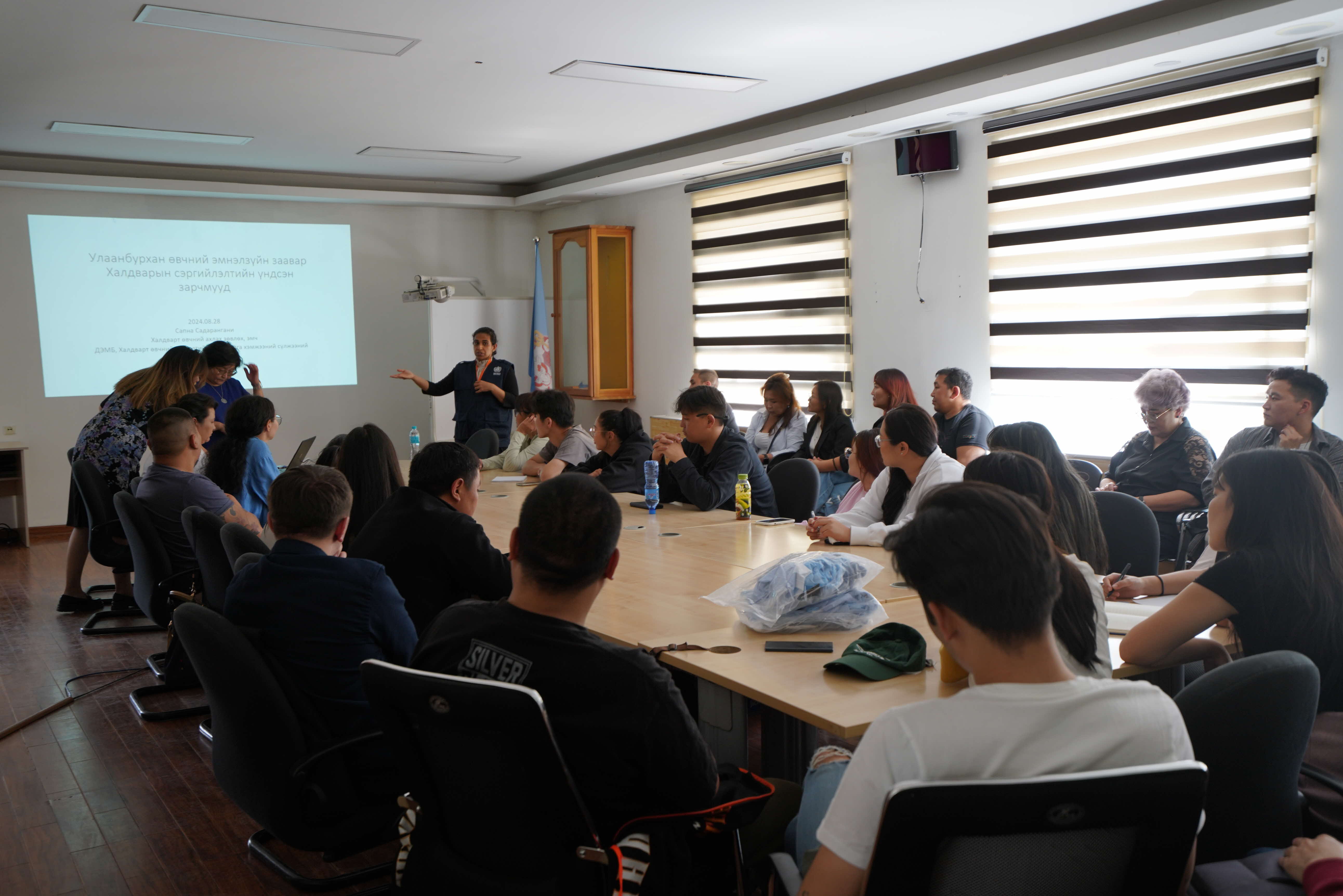 GOARN expert leads a training session for healthcare workers in Mongolia in clinical management of measles