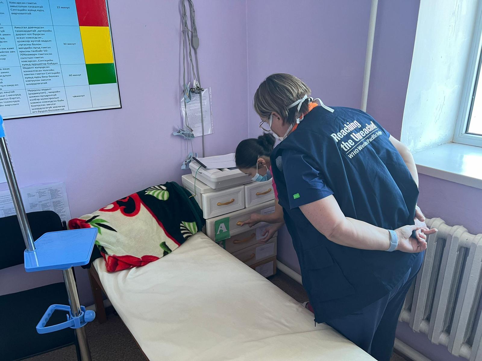 GOARN expert reviews an isolation room in a health facility in Mongolia