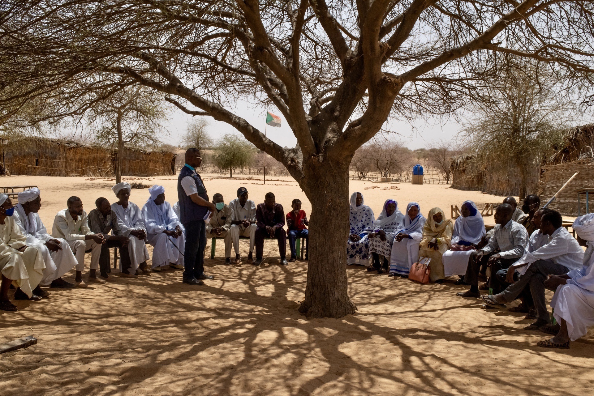 Darfur, Sudan, community dialogue People sitting in a reunion under a tree