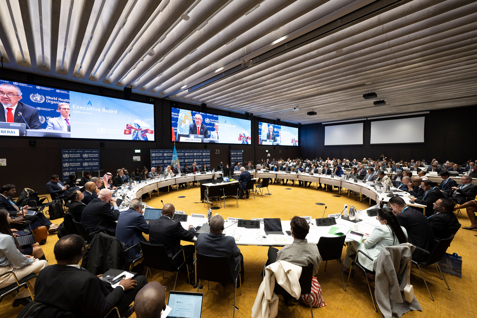 Large group of people sitting in a conference room