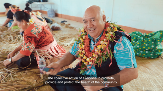 WHO Regional Director Dr Saia Ma'u Piukala weaving a mat with a community in Tonga