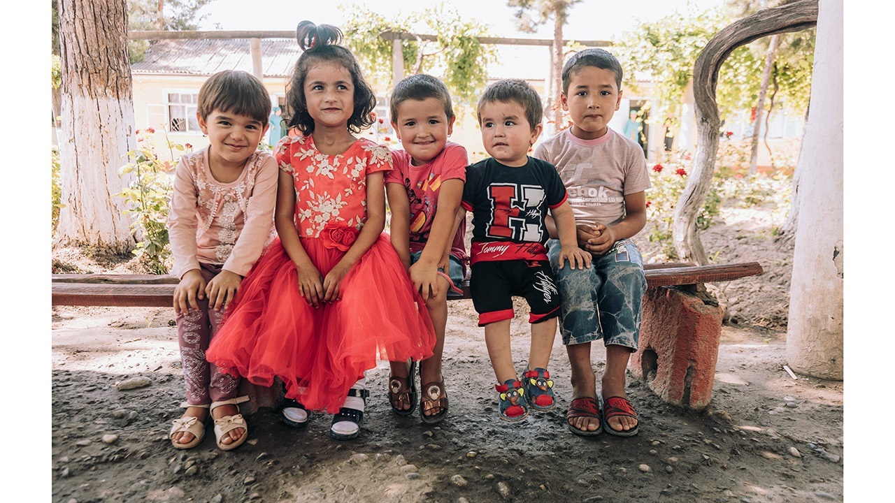 Children sitting on a bench