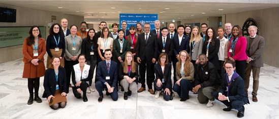 Participants of the WHO Youth Council lined up for a group photo with the Director-General.