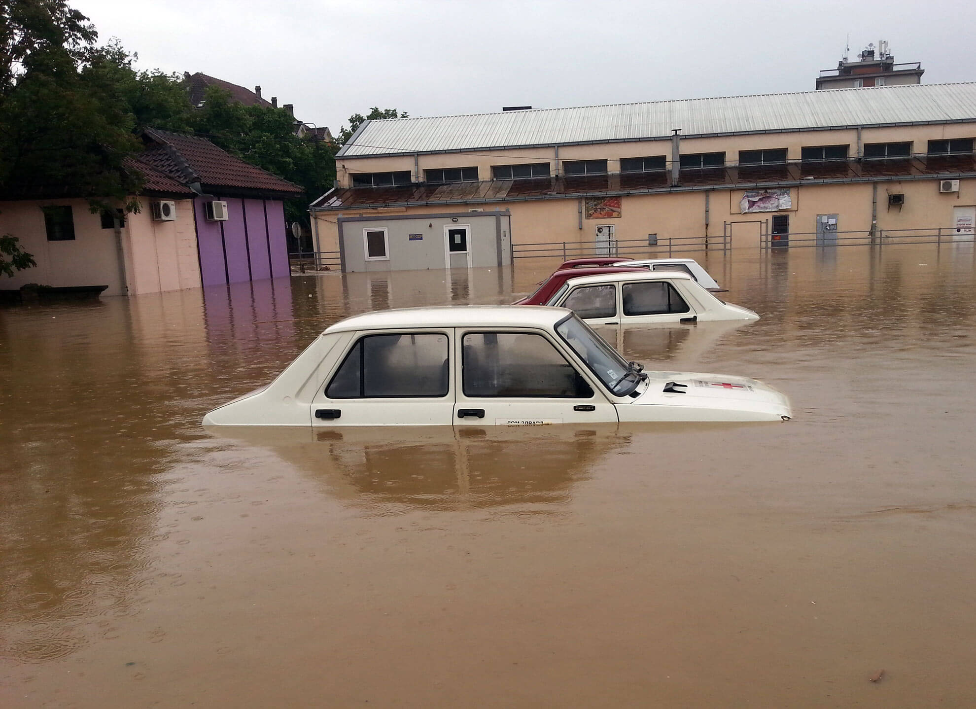 A parking lot flooded with water