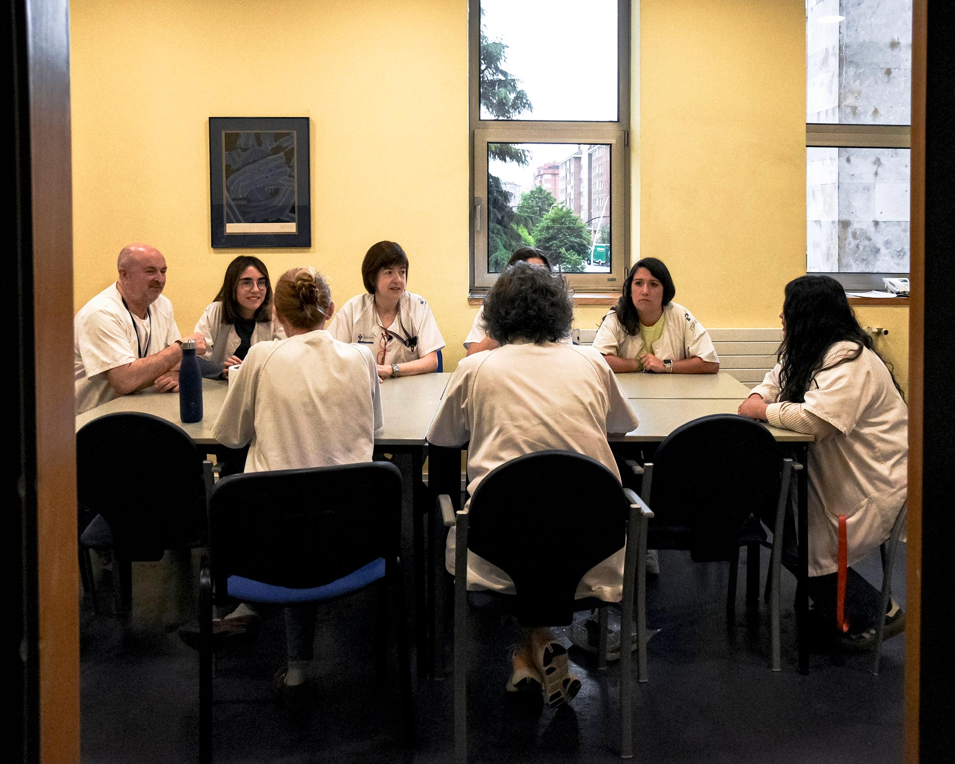 Social workers and health workers in a meeting.